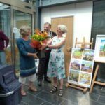 Peak District Train Porject. Alison receiving flowers.